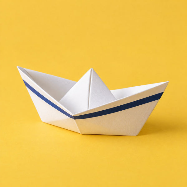 Emotional Start - royalty free cinematic music track, paper origami boat cover art by Music Radio Creative